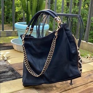 Black purse with Leopard Accent